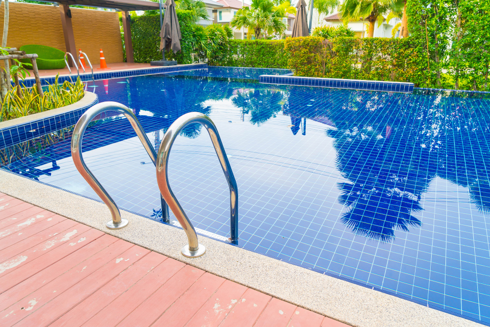 pool staircase with dark blue tiles
